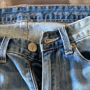 Guys Calvin Klein washed blue jeans